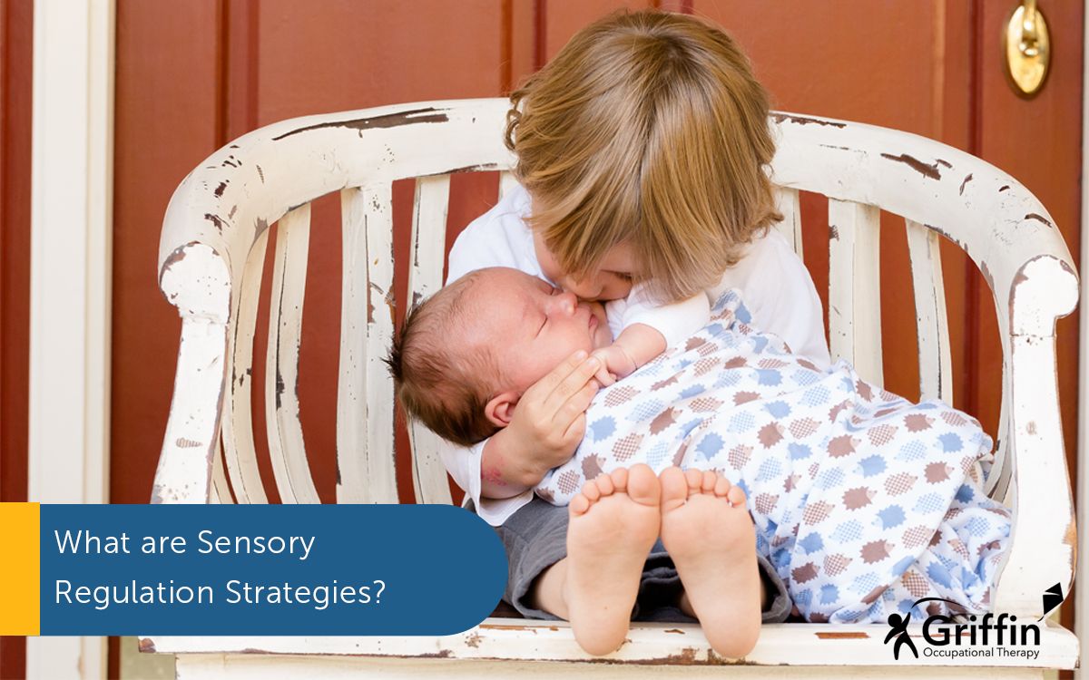 child holding sibling text what is sensory regulation