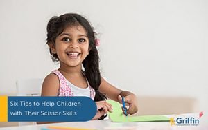 child cutting with scissors text helping with scissor skills