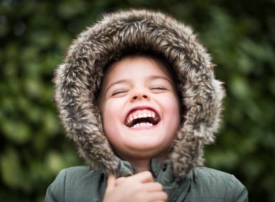 sensory processing and arousal boy with jacket hood over head laughing text what is arousal